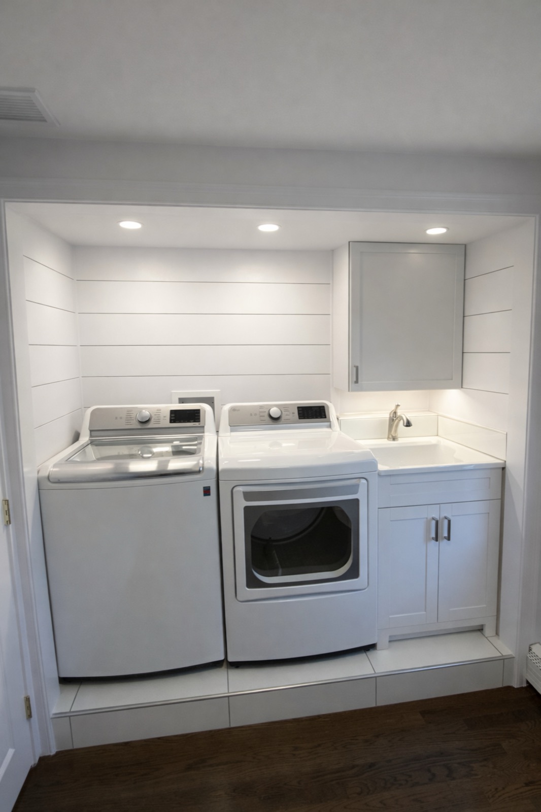 Custom laundry area with built-in storage